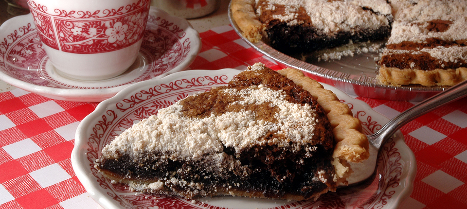 Warm atmosphere inside the Dutch Kitchen with diners enjoying a meal
